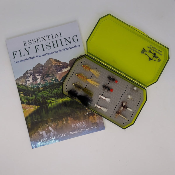 a book about fly fishing and set of 12 flies in a transparent green fly box