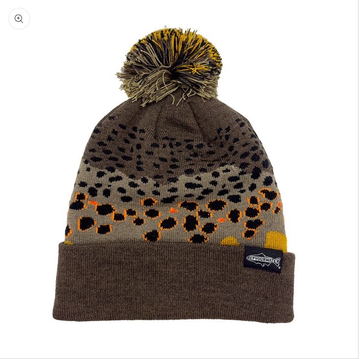 Brown merino knit hat with pom pom, leopard pattern and logo patch