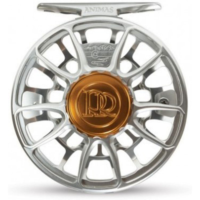 Silver fly fishing reel spool with cutout spokes and gold-tone center cap