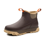 Brown ankle rain boot with tan lining and orange pull loop