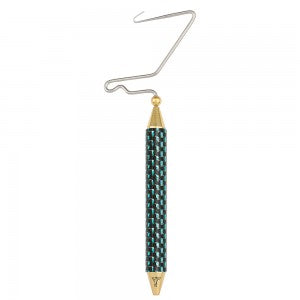 Carbon fiber whip finish tool with green textured handle and gold metal end caps