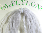 Yarn wig in light gray with tufted fringe and clip