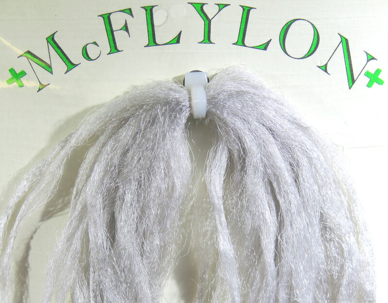 Yarn wig in light gray with tufted fringe and clip