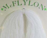 Yarn wig in white with tufted fringe and clip