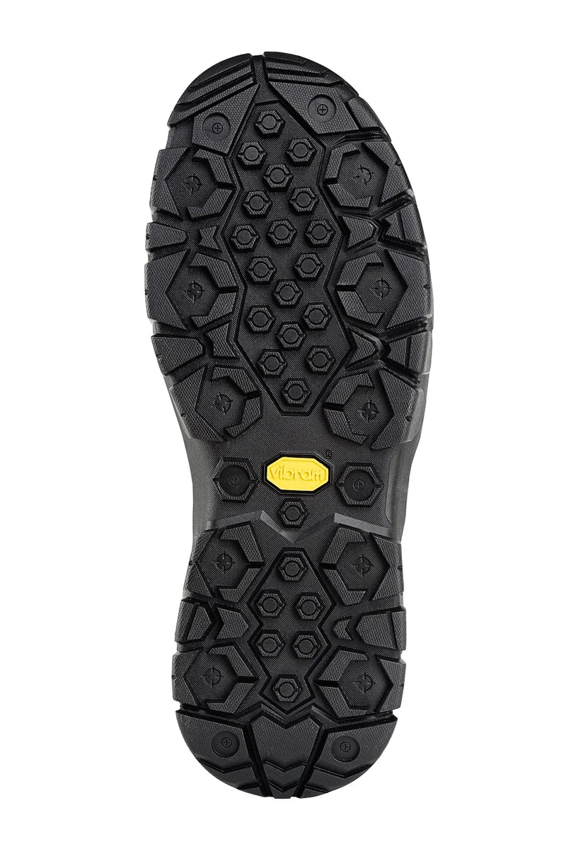 Rubber boot outsole with deep hex tread pattern and yellow traction insert
