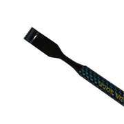 Carbon fiber dubbing rake angled view, black comb tip on turquoise-blue patterned handle