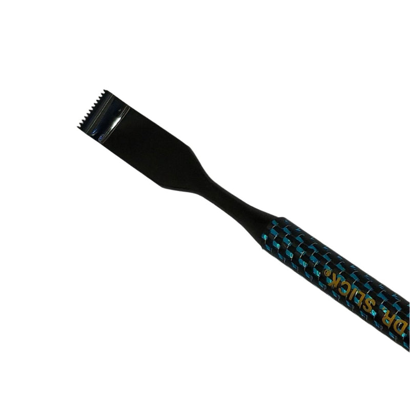 Carbon fiber dubbing rake angled view, black comb tip on turquoise-blue patterned handle