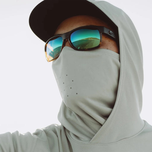 a face showing the use of the built in mask on the grundens masked sun hoodie