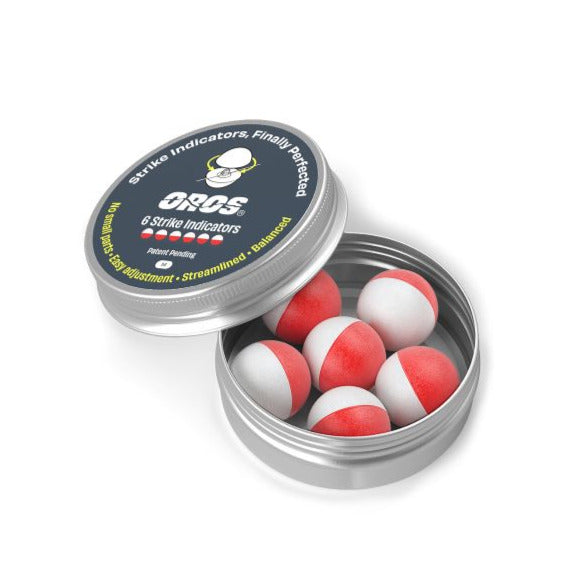 Open silver tin with six red-and-white foam strike balls