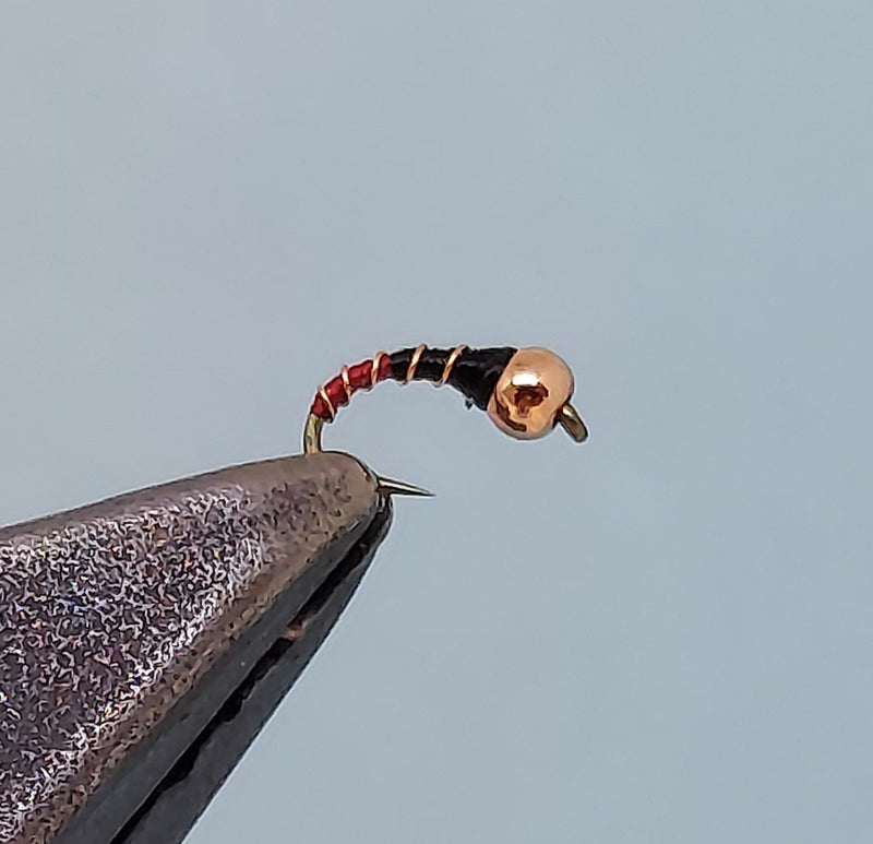 Two tone zebra midge bead bracelet with copper-tone clasp