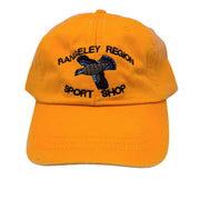 Flying Grouse hat, orange, embroidered flying grouse and Sport Shop lettering.