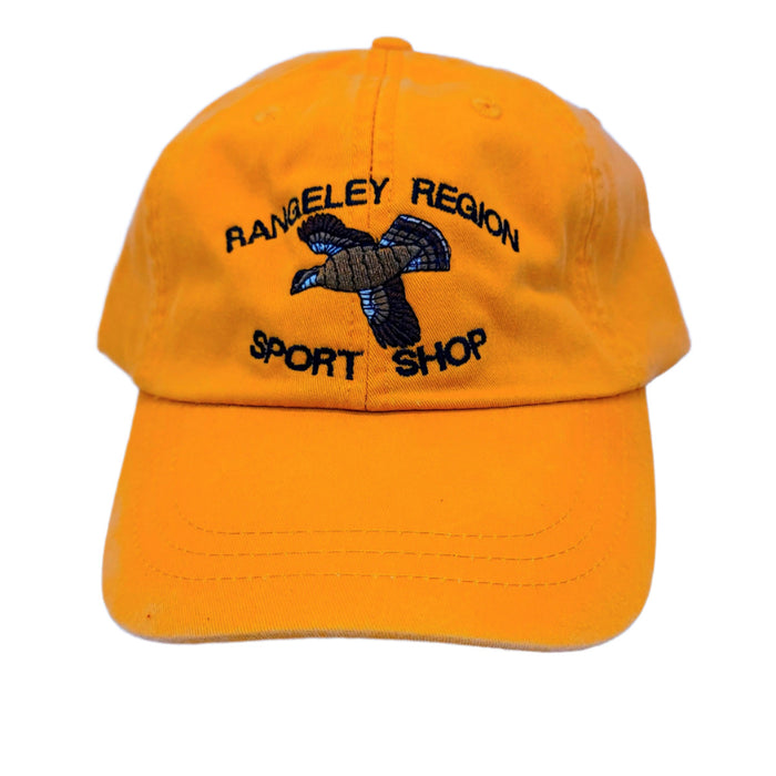 Tangerine orange Adams ball cap with embroidered flying grouse and shop name