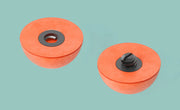 Orange foam strike indicators with black bases and central holes