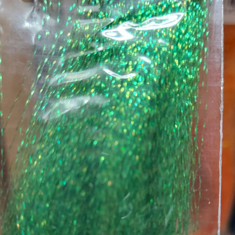 Green iridescent sparkly tinsel fibers with holographic glitter