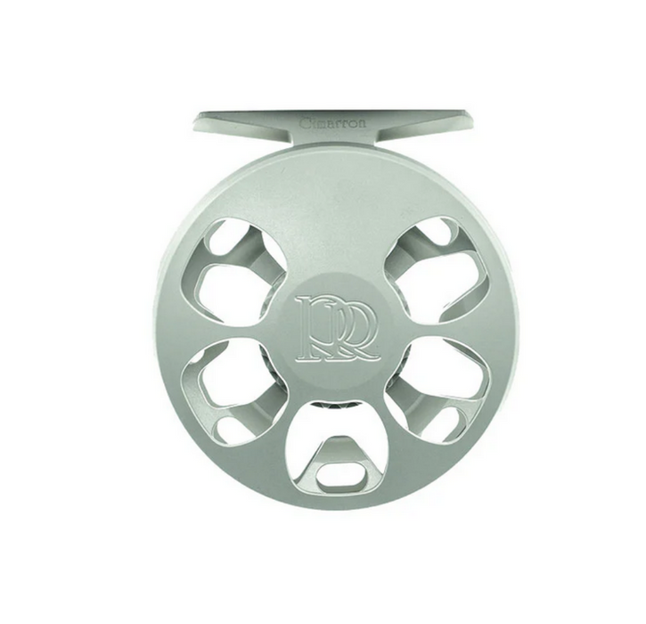 Light gray fly fishing reel on a white background