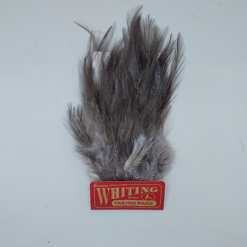 Whiting tailing pack with gray and dark mottled feather fibers