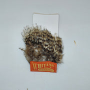 Whiting tailing pack with tan, brown, and black mixed feather fibers