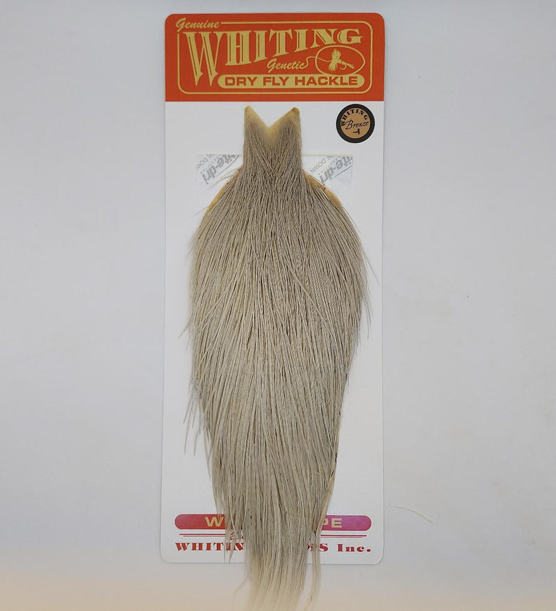 Bronze cape fly hackle feather, light dun/gray-white dyed, slender plume
