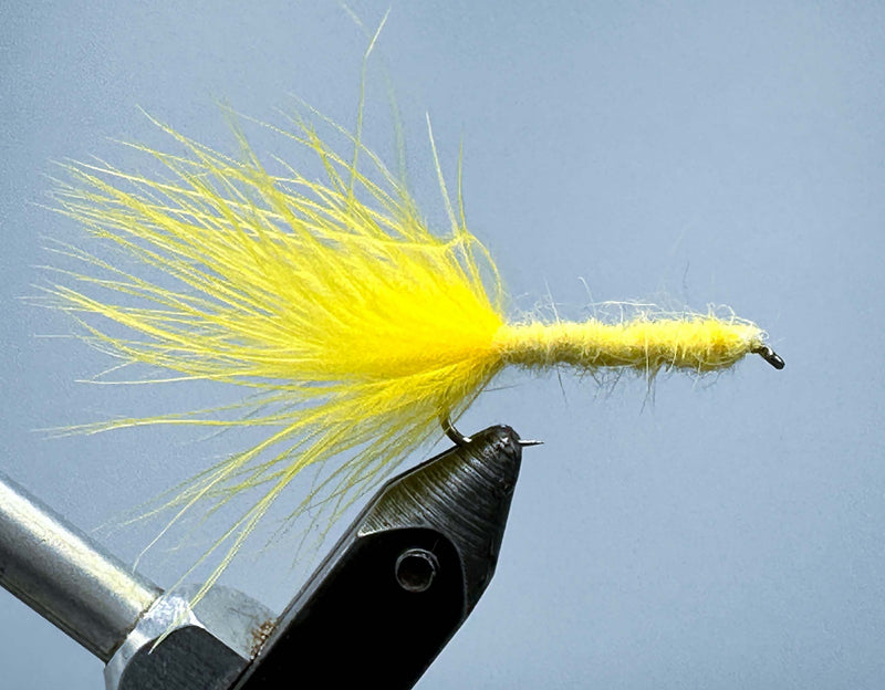 Yellow feathered nymph-style fishing lure on a hook