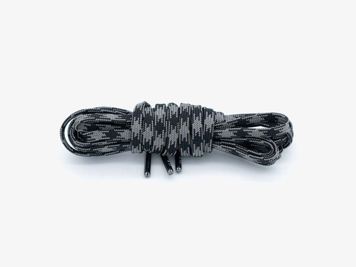 Yakoda Guide laces in gray camo, bundled with two lace tips and grommets