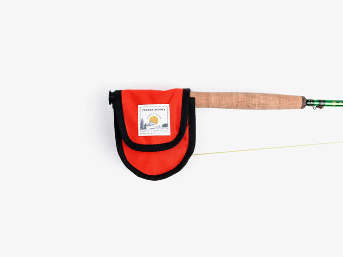 Yakoda reel cover in red with black trim and label pouch