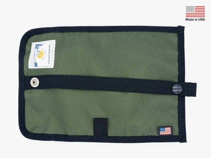 Streamer stash interior panel in olive with dark trim and grommet