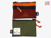 Yakoda utility wallet with orange top panel, black mesh, two zippers, olive base pouch