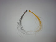 Quill body fly with gray and brown feather fibers, looped bundle