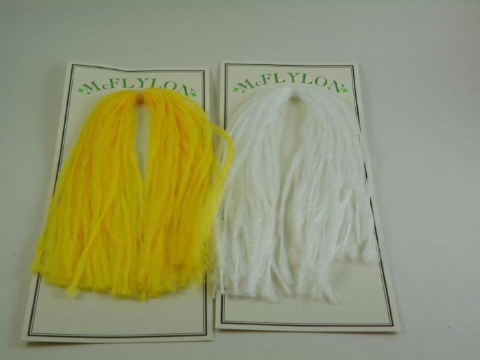 Yarn wig in yellow and white with tufted fringe and clip
