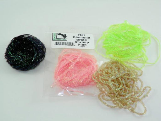 four colors of flashy body material used in tying fly fishing flies 