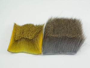 yellow and natural patches of deer hair used for tying fly fishing flies