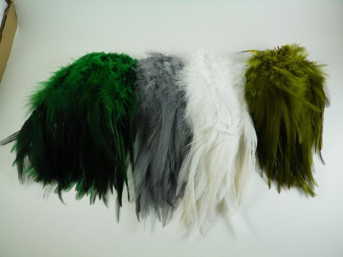 Strung rooster saddle feathers bundle in green, gray, white, and olive tones.