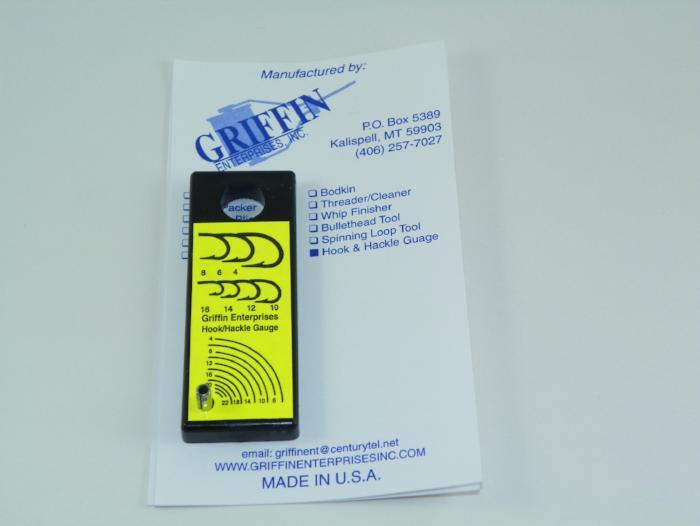 Hook and hackle gauge tool with yellow scale markings and black frame