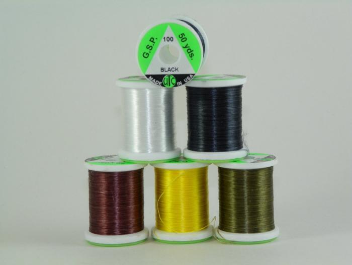 G.S.P. 100 thread spools in black, white, brown, yellow, and olive; green labels