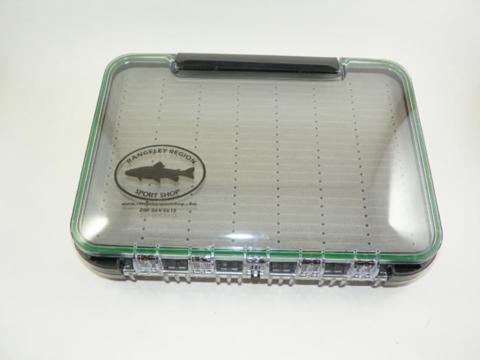 Two-sided waterproof fly box with clear lid, green trim, and divided compartments