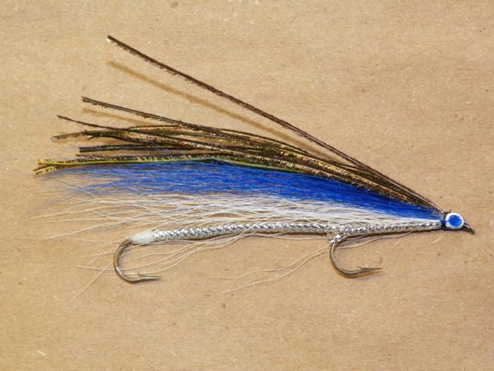 The blue smelt tandem trolling fly topped with peacock herl 