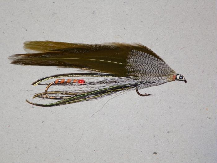 Olive tandem fishing lure with feathered body and red bead