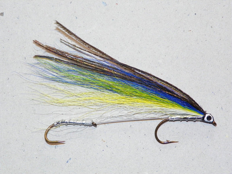 Fishing lure with blue back and feathered body, two metal treble hooks