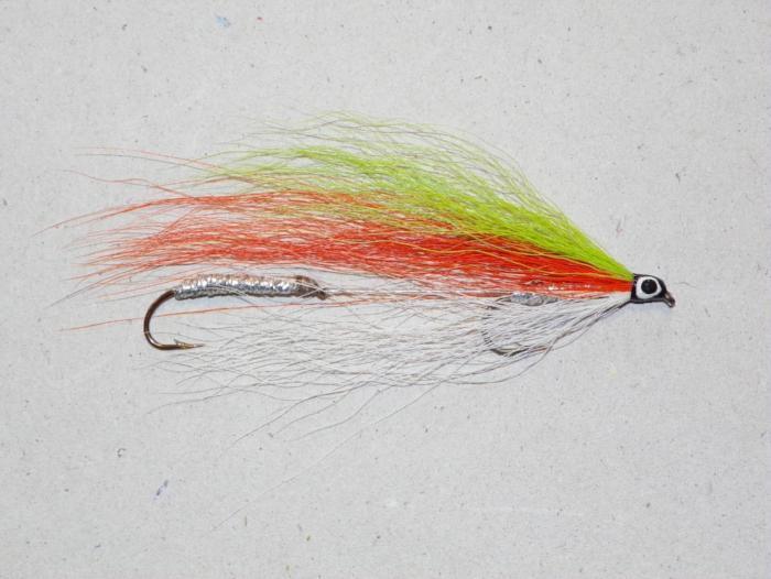 Tri-color fishing lure with multicolored strands and metal hook