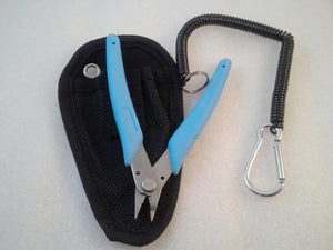 blue handled pliers with line cutter excellent for bending barbs on fly fishing flies with a black holster and coil retracter