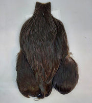 Streamer cape with dark brown fur body and dark paw-like cuffs