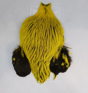Streamer cape with yellow fur body and black paw-like cuffs with spots