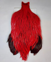 Streamer cape with bright red fur body and black paw-like cuffs