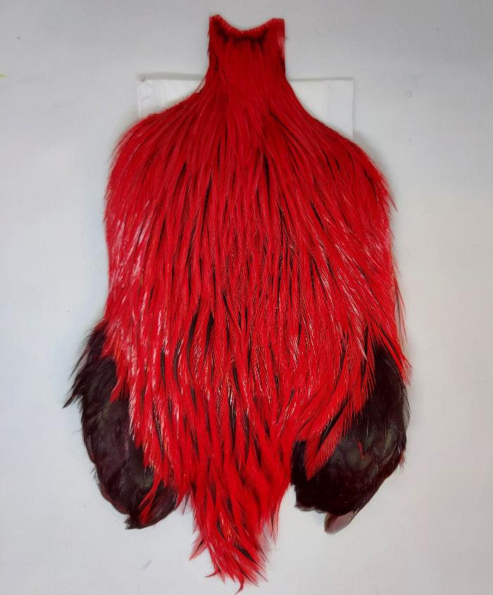 Streamer cape with bright red fur body and black paw-like cuffs