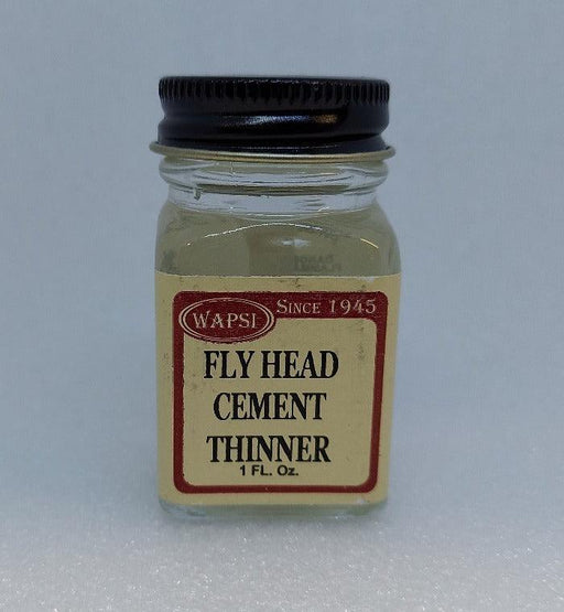 a one ounce bottle of Wapsi fly  head cement thinner