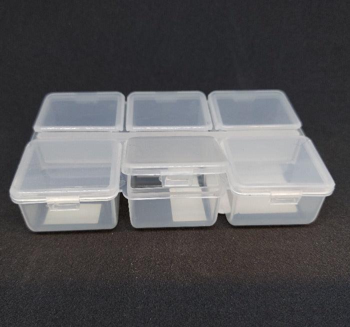 Clear plastic 6-compartment snap-top storage box with hinged lids