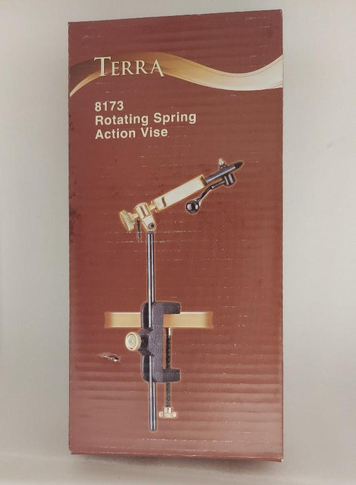 a box containing a Terra brand rotating spring action vise for tying flies