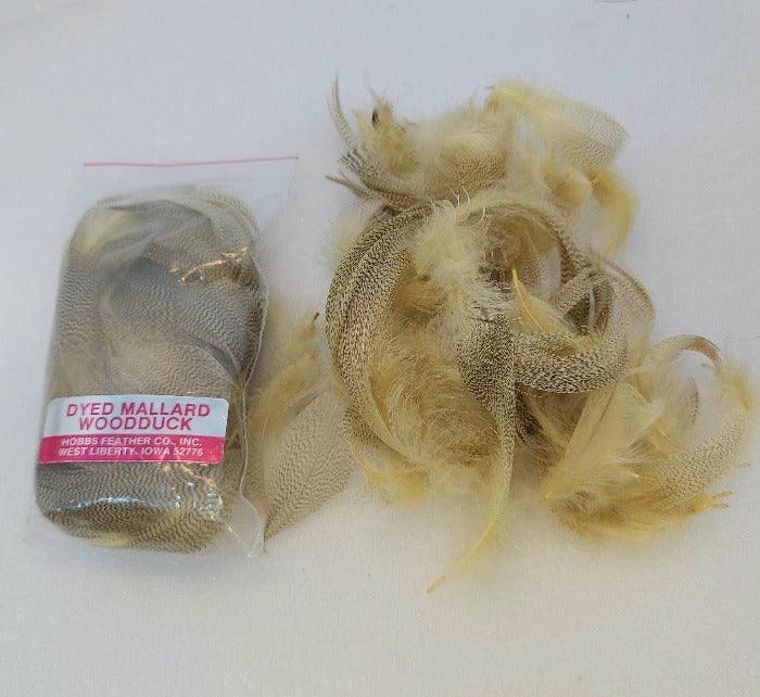Dyed mallard feathers, light beige and yellow, in small pouch and loose