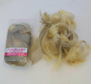 A full package of dyed Mallard woodduck and the contents of a second package.