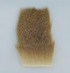 a 2" by 3" piece of deer hair that has been bleached and is perfect for stimulators . From Nature's Spirit